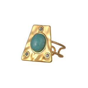 Vintage golden trapezoid ring featuring turquoise stone and sparkling cubic zirconia crystals