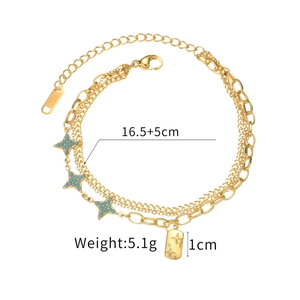 Détail du bracelet étoile lune doré avec breloques bleues et mesures indiquées