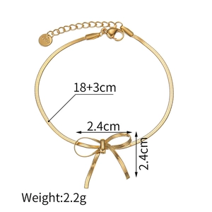 Detailed view showing the 18+3cm chain length and 2.4cm golden bow bracelet pendant