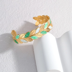 Minimalist 18K gold plated leaf cuff bracelet with green and white enamel leaf texture