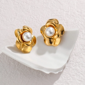 Elegant gold camellia flower pearl stud earrings with a vintage French aesthetic