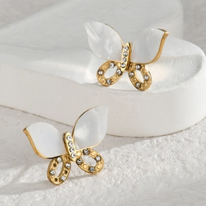 French butterfly stud earrings in gold with white shell inlay and sparkling diamonds