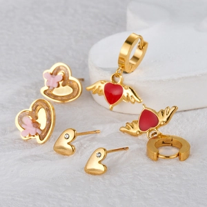 Three pairs of vintage heart stud earrings with red enamel wings and pink butterflies