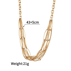 Detail of layered gold chain necklace showing 43+5cm length and different link patterns