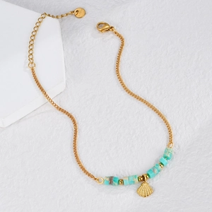 Gold stainless steel ocean anklet featuring turquoise beads and a shell pendant