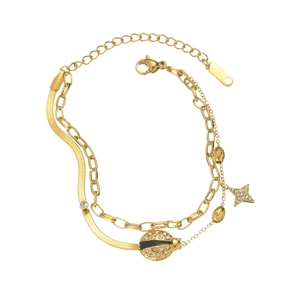 Gold double-layered titanium steel bracelet with ladybug and star charms in white background