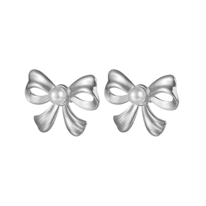 Silver bow stud earrings with round white pearls on a clean white background