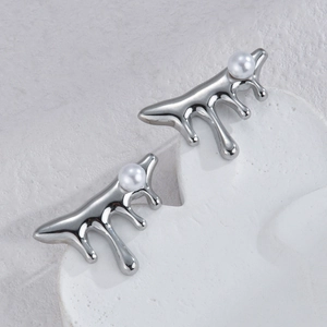 Irregular lava drop earrings in liquid metal silver with elegant white pearls for women