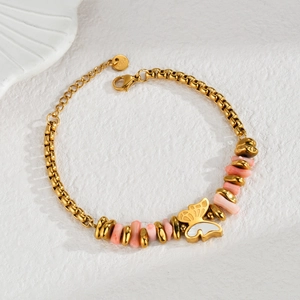 Gold stainless steel bracelet with pink natural stones and white shell butterfly charm