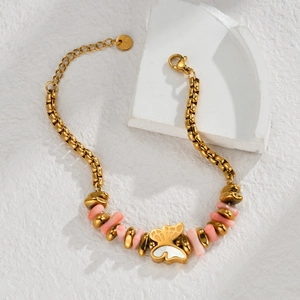 Pink beaded stainless steel bracelet with a gold butterfly charm and mother of pearl inlay