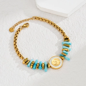Vintage stainless steel gold bracelet with blue stones and dolphin charm pendant