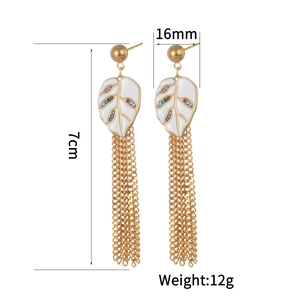 Golden fringe leaf drop earrings with colorful crystals and white enamel tassel detail