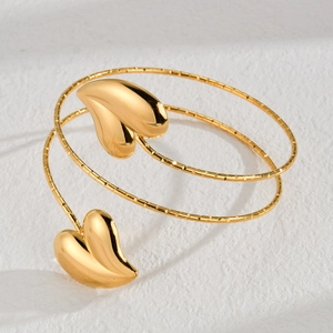 Chic gold spiral stainless steel cuff bracelet with butterfly accents and textured finish