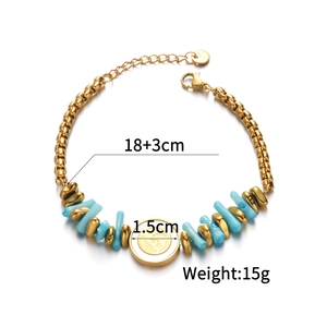 Vintage style gold chain bracelet with blue natural stones and round pendant charm