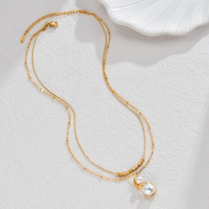 Double-layered 18K gold plated necklace with freshwater pearl pendants and gold cubes