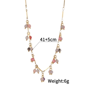 Ethnic style beaded tassel necklace with colorful crystal beads and a gold stainless steel chain