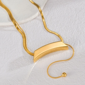 Minimalist gold curved bar pendant necklace with sleek snake chain and adjustable clasp