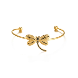 Detailed close-up of 18K gold plated dragonfly bangle with black zircon micro-pave setting