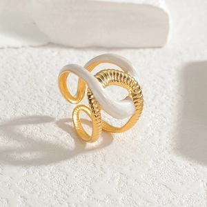 Gold-plated titanium ring with white enamel finish and textured adjustable open band