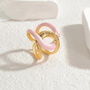 Chic gold-plated titanium ring with pink enamel detail and textured abstract design