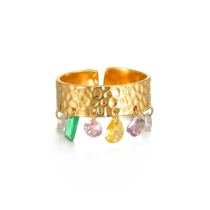 Detail of 18K gold-plated hammered ring featuring colorful zircon gemstone pendants