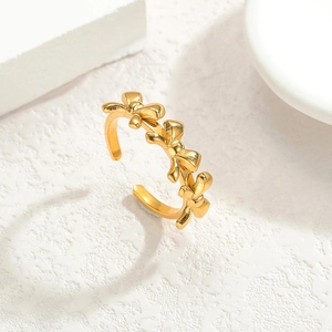 Polished 18k gold stainless steel open ring with three elegant bowknot motifs