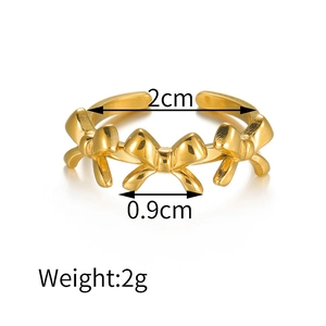 18k gold plated stainless steel open ring featuring three polished bowknot designs