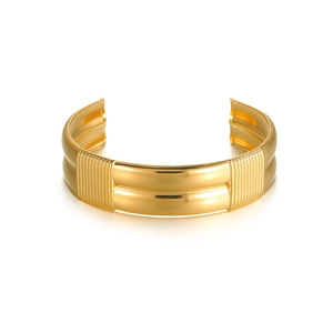 Bracelet jonc ouvert en acier inoxydable doré avec des motifs verticaux gaufrés