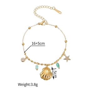 Gold 18k plated stainless steel bracelet with blue stone and shell star pendants