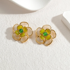 Elegant camellia flower earrings with cat eye stones and golden stainless steel frame