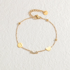 Bracelet empilable en acier inoxydable doré 18k avec breloques sourire et cœur