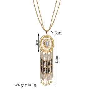 Sautoir bohème vintage avec pompons perle, pendentifs étoiles dorées et dimensions