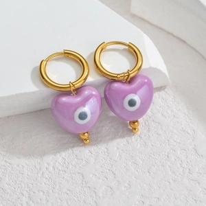 Boucles d'oreilles créoles dorées en acier avec cœurs violets et œil protecteur