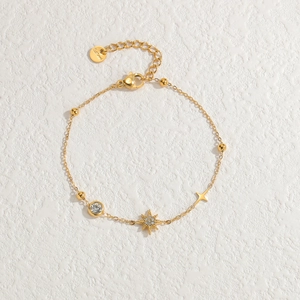 Elegant gold stainless steel star bracelet with sparkling rhinestones and adjustable chain