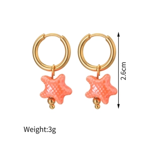 Boucles d'oreilles étoile de mer en acier doré 18K et céramique orange corail