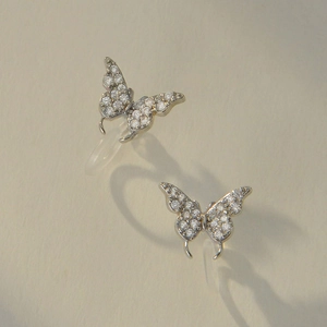 Elegant butterfly ear clips with silver base and sparkling white stones for non-pierced ears