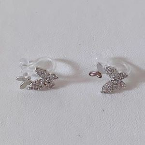Elegant silver butterfly clip earrings with sparkling crystals for non-pierced ears