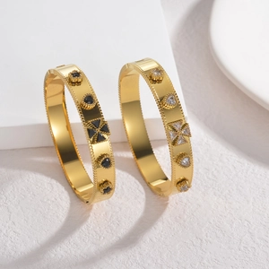 Vintage gold titanium steel bracelet set with star and heart charms and zircon stones