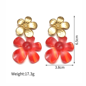 Elegant floral pearl earrings with red acrylic flowers and gold hammered finish studs