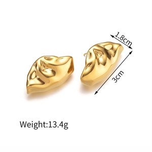 Vintage gold oval earrings with irregular hammered texture and liquid metal finish