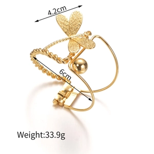 Detail view of gold-plated dragonfly bracelet with dimensions 6cm and 4.2cm shown
