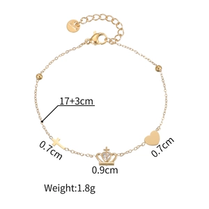 Bracelet en acier inoxydable doré avec breloques croix, couronne en cristal et cœur évidé