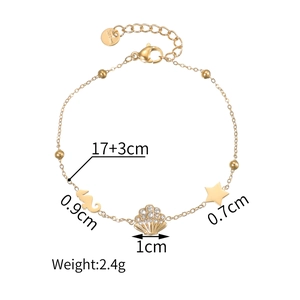 Bracciale dorato in acciaio inossidabile con ciondoli a cavalluccio, conchiglia e stella