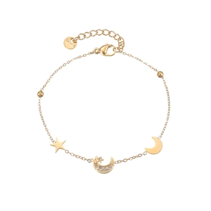 Elegant gold celestial bracelet with star and moon charms and cubic zirconia accents