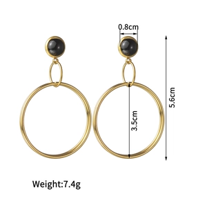 Golden geometric circle earrings with black round studs and vertical drop design