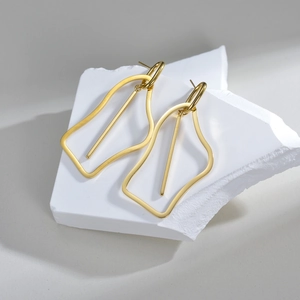 Polished gold irregular hollow geometric earrings for women with a minimalist aesthetic