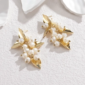 Exaggerated golden leaf and white rose floral drop earrings in stainless steel