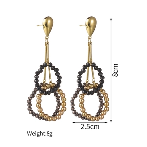 Fashionable golden water drop tassel earrings with beaded charms for elegant women
