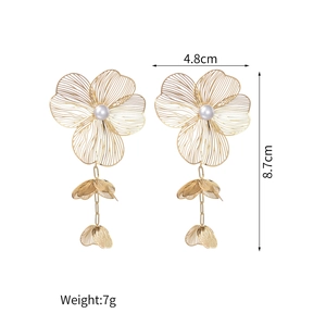 Golden flower tassel earrings with stainless steel wire weave and pearl detail