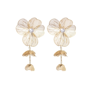 Elegant gold mesh flower earrings with white pearl and long tassel dangles on white backdrop
